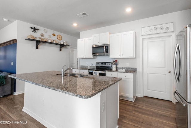 1524 Pleasant Hollow Ct SE, Bolivia, NC 28422 - kitchen with visible vents, open shelves, a sink, appliances with stainless steel finishes, and dark wood-style floors