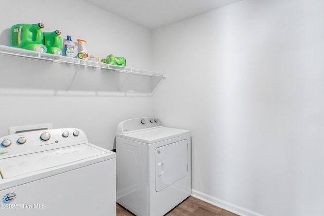 1524 Pleasant Hollow Ct SE, Bolivia, NC 28422 - washroom featuring washer and clothes dryer, wood finished floors, laundry area, and baseboards