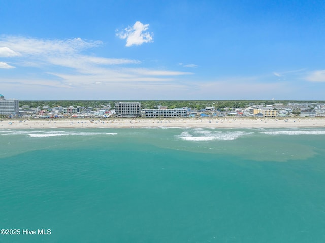 aerial view of waterfront with a beach