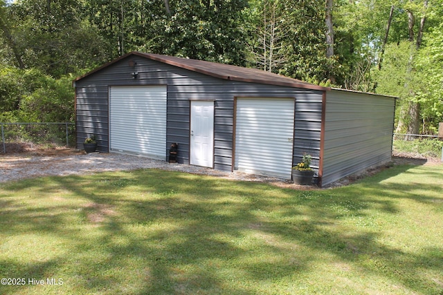 detached garage with fence