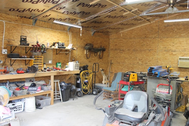 storage area featuring a ceiling fan