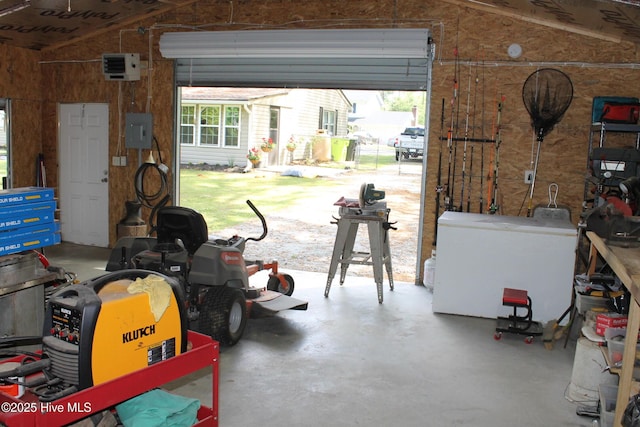 garage featuring wooden walls