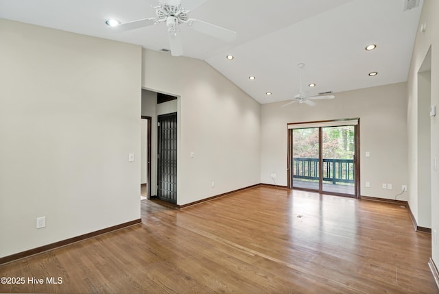 spare room featuring recessed lighting, a ceiling fan, high vaulted ceiling, and wood finished floors