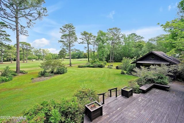 view of yard featuring a wooden deck
