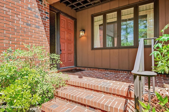 doorway to property featuring a porch