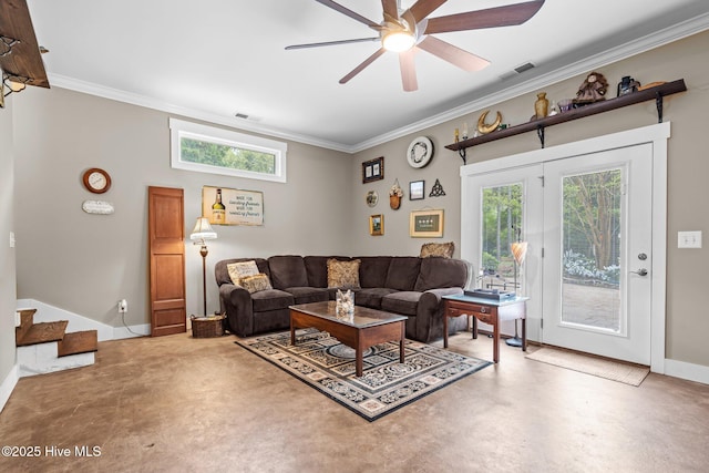 living room with visible vents, crown molding, and a healthy amount of sunlight