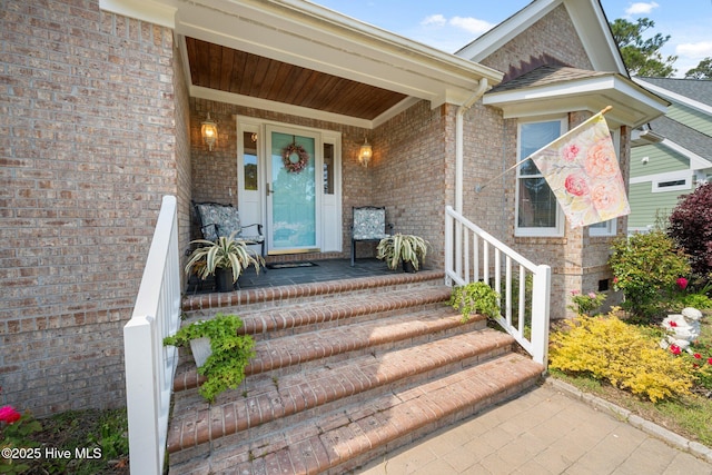 3378 Willow Cir SE, Southport, NC 28461 - entrance to property featuring brick siding and a porch