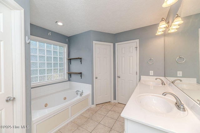 bathroom with double vanity, a sink, and tile patterned flooring