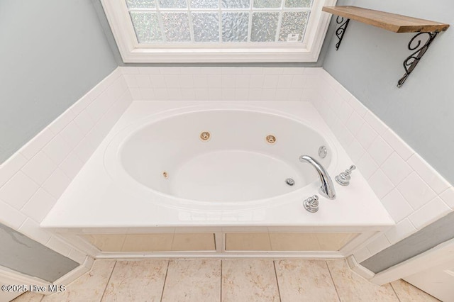 full bath with a tub with jets