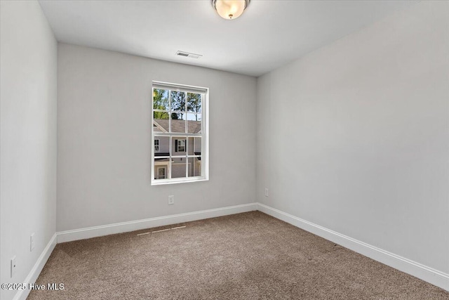 354 Trevally Ct, Southport, NC 28461 - carpeted empty room with baseboards
