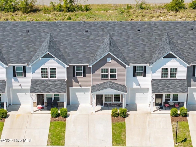 354 Trevally Ct, Southport, NC 28461 - view of front of property with driveway, a garage, and a shingled roof
