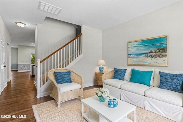 354 Trevally Ct, Southport, NC 28461 - living room featuring wood finished floors, stairway, and baseboards