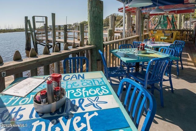 354 Trevally Ct, Southport, NC 28461 - wooden deck featuring a water view