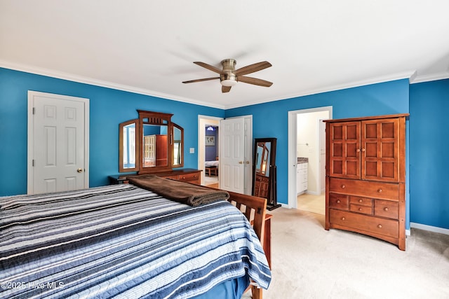 carpeted bedroom with connected bathroom, a ceiling fan, baseboards, and ornamental molding