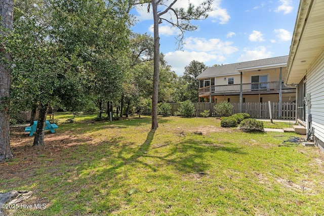view of yard with fence