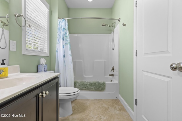 bathroom featuring shower / bathtub combination with curtain, vanity, and toilet