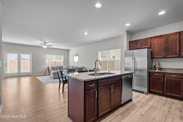 4541 Parsons Mill Dr, Castle Hayne, NC 28429 - kitchen with ceiling fan, light wood-type flooring, a sink, and appliances with stainless steel finishes