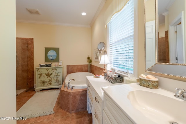 bathroom with vanity, ornamental molding, tile patterned floors, a bath, and a tile shower