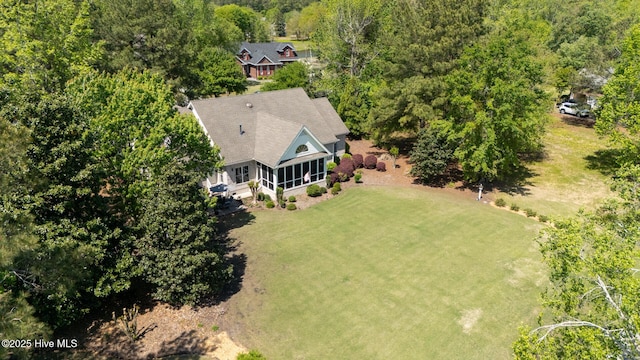bird's eye view featuring a forest view