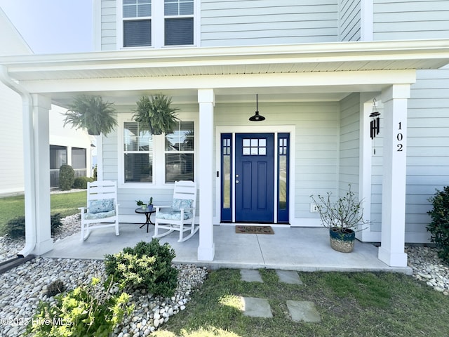 property entrance with a porch