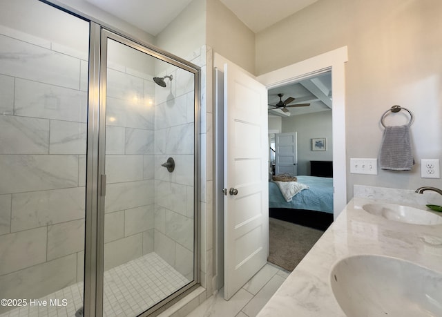 bathroom with a shower stall, ensuite bath, ceiling fan, and a sink