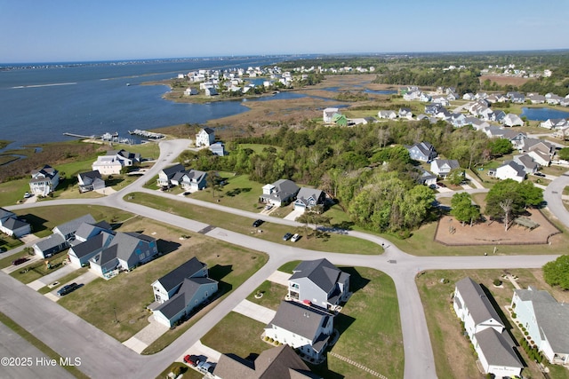 aerial view featuring a water view and a residential view
