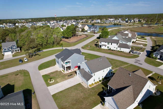 bird's eye view with a water view and a residential view