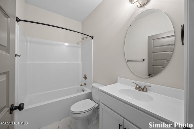 full bath with bathing tub / shower combination, vanity, marble finish floor, and toilet