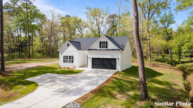 exterior space featuring driveway, a garage, and a lawn