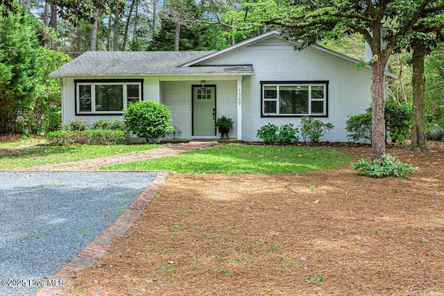1369 Linden Rd, Aberdeen, NC 28315 - view of front of house featuring brick siding