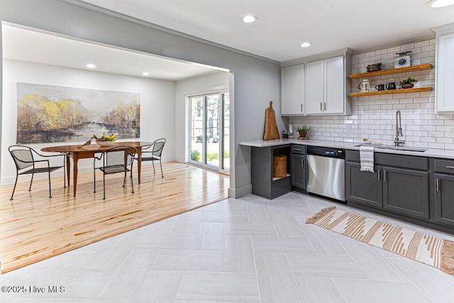 1369 Linden Rd, Aberdeen, NC 28315 - kitchen with dishwasher, a sink, light countertops, recessed lighting, and open shelves