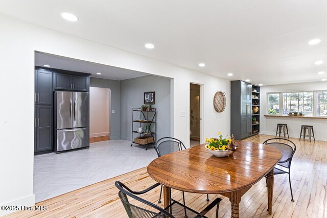 1369 Linden Rd, Aberdeen, NC 28315 - dining space featuring recessed lighting, parquet flooring, and baseboards