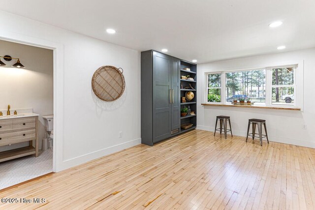 1369 Linden Rd, Aberdeen, NC 28315 - living area featuring light wood finished floors, baseboards, and recessed lighting