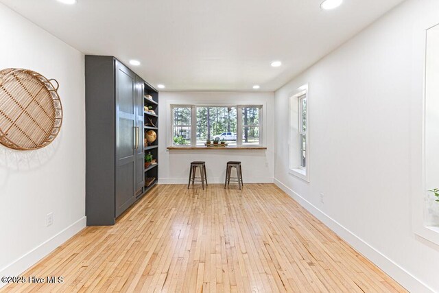1369 Linden Rd, Aberdeen, NC 28315 - home office featuring light wood-style floors, recessed lighting, and baseboards
