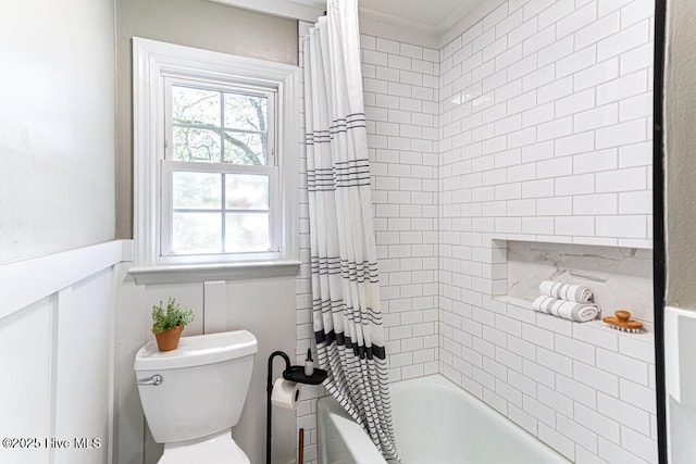 1369 Linden Rd, Aberdeen, NC 28315 - bathroom featuring toilet, shower / bath combo with shower curtain, and crown molding