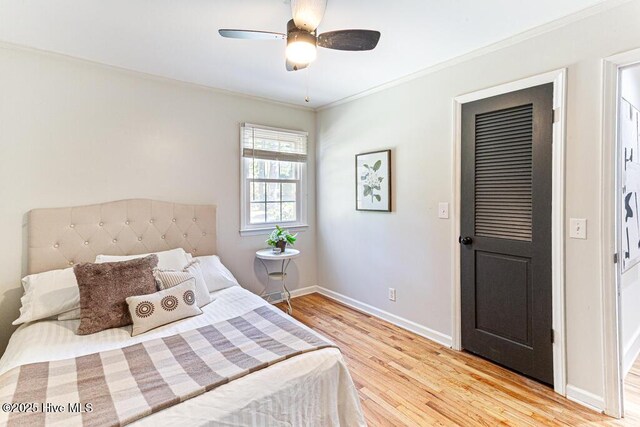 1369 Linden Rd, Aberdeen, NC 28315 - bedroom featuring light wood-type flooring, baseboards, ornamental molding, and a ceiling fan