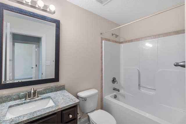 bathroom featuring vanity, tub / shower combination, visible vents, and toilet
