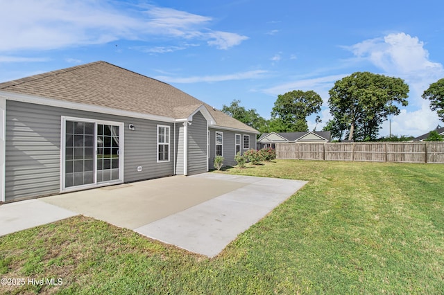 view of yard with a patio area and fence