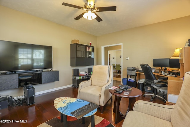 office with ceiling fan, baseboards, and wood finished floors