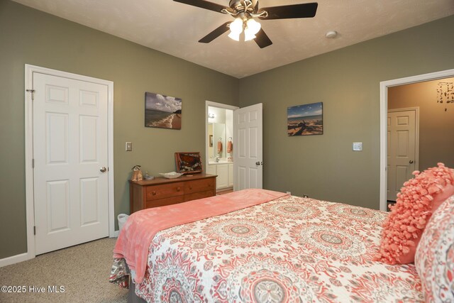 bedroom with light colored carpet and ceiling fan
