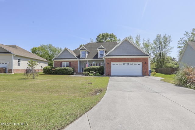 view of front of house with concrete driveway, an attached garage, brick siding, and a front yard