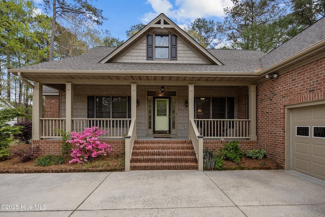 view of front of house featuring concrete driveway, an attached garage, brick siding, a porch, and roof with shingles