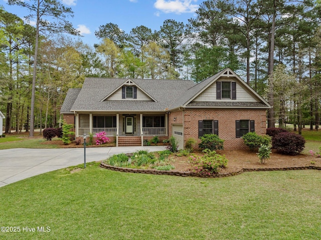 craftsman-style house with concrete driveway, a front lawn, a shingled roof, a porch, and brick siding