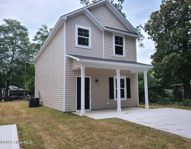 460 Maides Ave, Wilmington, NC 28405 - view of front of home featuring board and batten siding and central AC