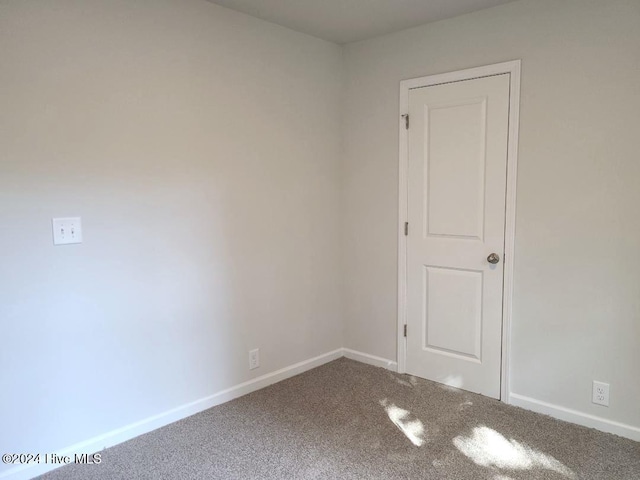 460 Maides Ave, Wilmington, NC 28405 - carpeted empty room with baseboards