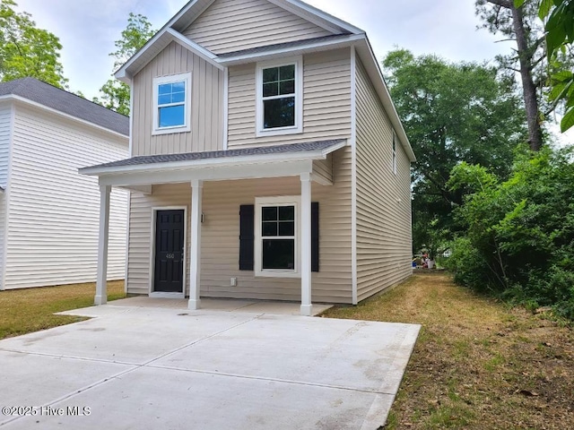 460 Maides Ave, Wilmington, NC 28405 - property entrance with board and batten siding and covered porch