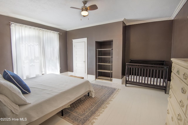 915 Saint David St, Tarboro, NC 27886 - bedroom featuring ceiling fan and ornamental molding