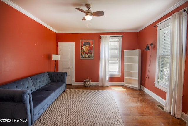 915 Saint David St, Tarboro, NC 27886 - living area featuring ceiling fan, ornamental molding, and a healthy amount of sunlight