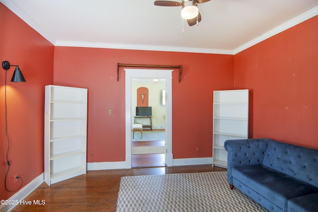 915 Saint David St, Tarboro, NC 27886 - living area featuring ceiling fan, baseboards, ornamental molding, and wood finished floors