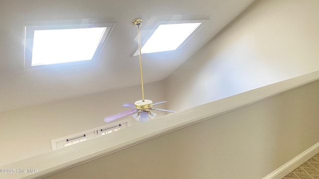 3772 Old Maco Rd NE, Leland, NC 28451 - interior details featuring a skylight, ceiling fan, and baseboards